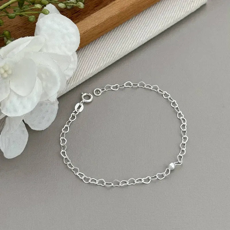 PULSEIRA TODA ELO CORAÇÃO C/ BOLINHA NO MEIO